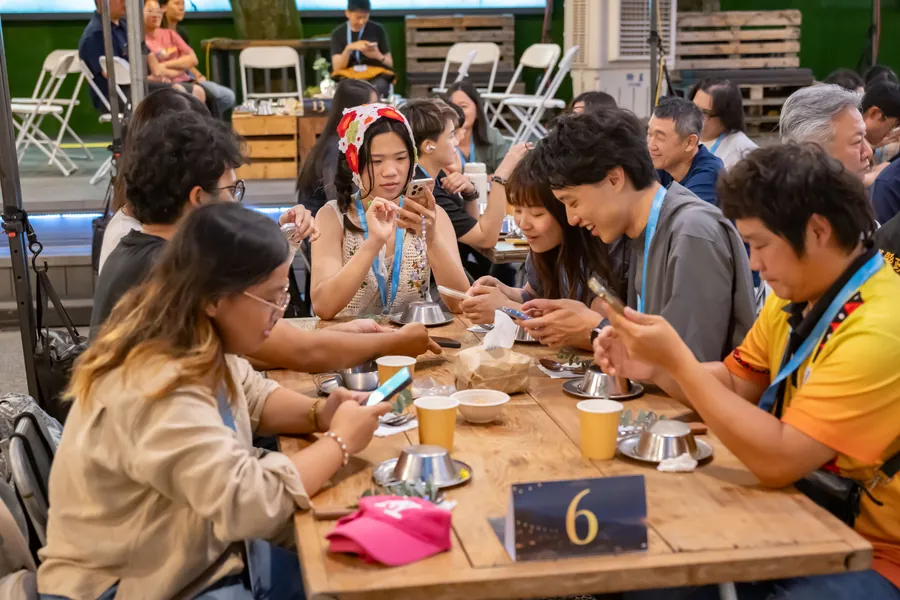 Nomads sharing an Indigenous long-table dinner at the Hualien workation