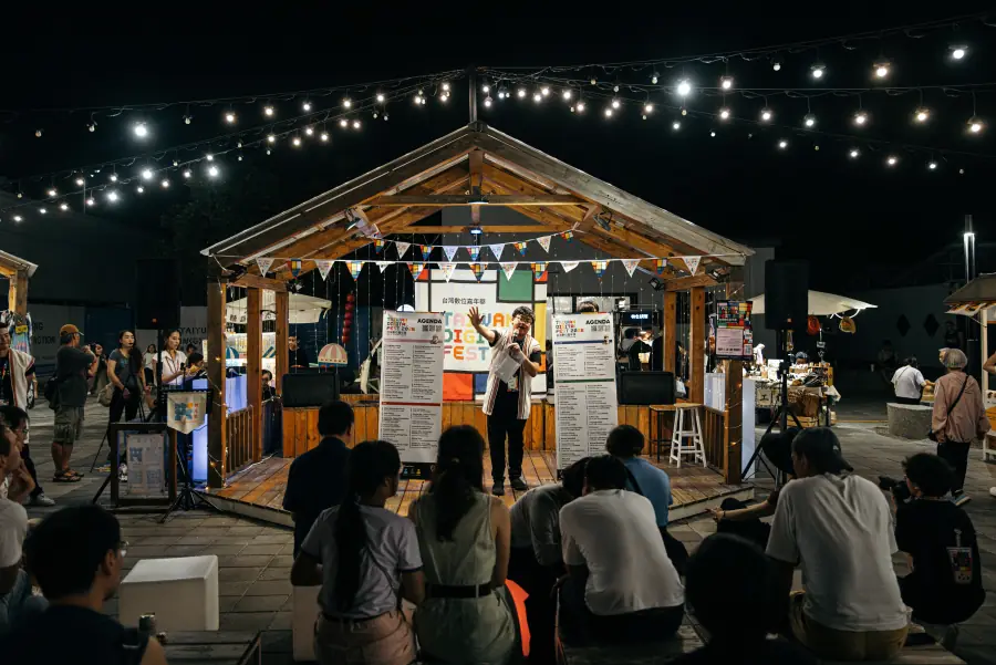 A speaker on the lit stage at the TDF 2026 opening night