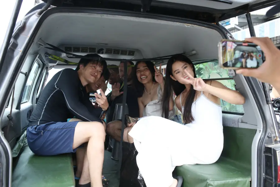 Nomads gathered for a coastal surf session