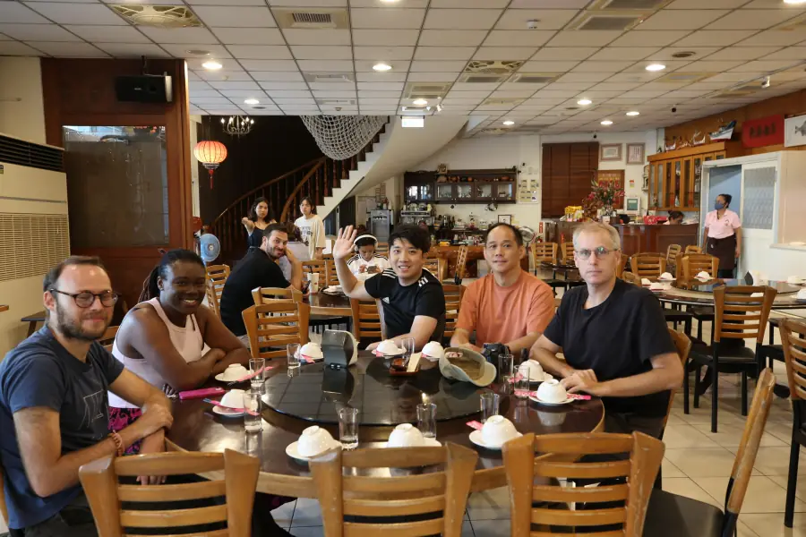 Friends gathered around the VIP dinner table