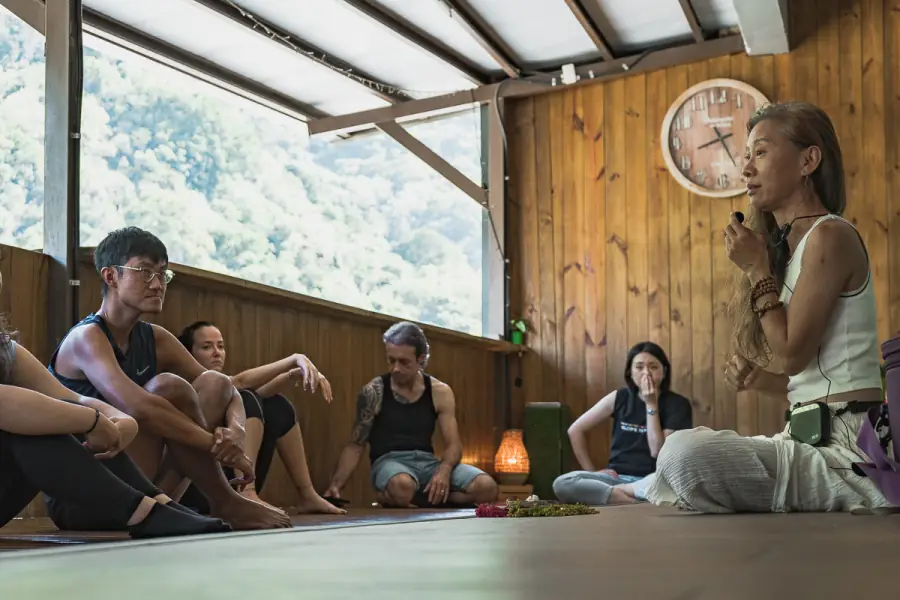 A morning yoga circle in a mountain studio