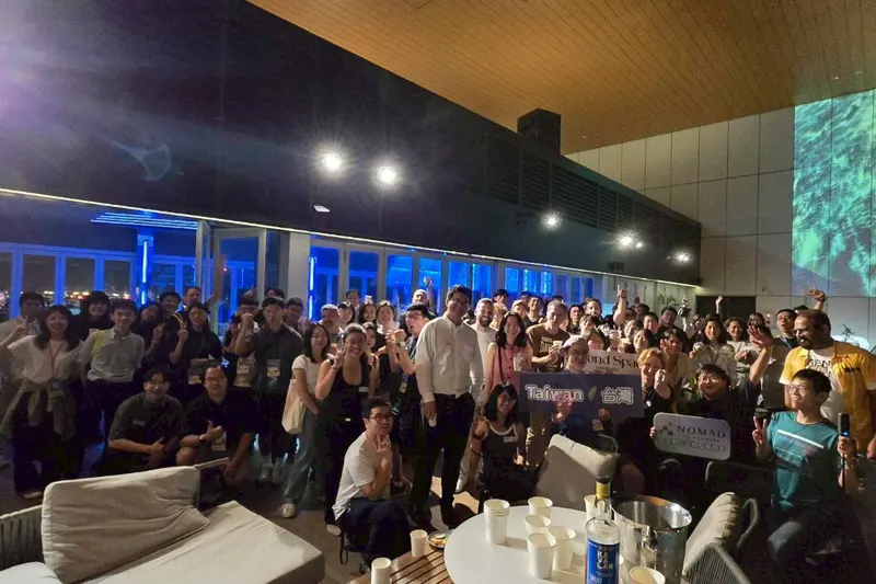 The Taiwan Digital Night community gathers beside the rooftop pool in Kaohsiung